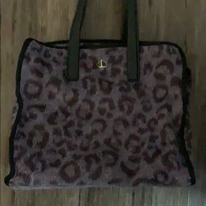 Like new Kate spade bag. Fur like leopard print.